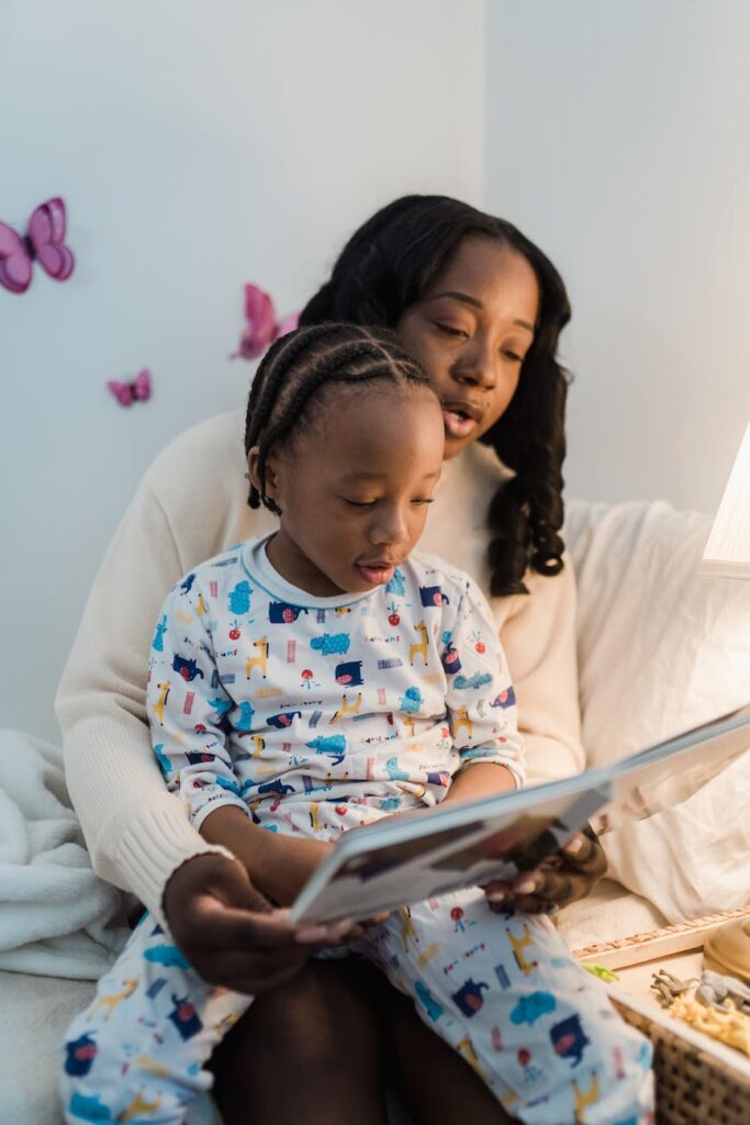 mother reading a bedtime story to her son